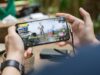 How to Improve Your Aim in BGMI: 10 Practical Tips for Beginners Mobile gamer practising a battle royale game on a smartphone